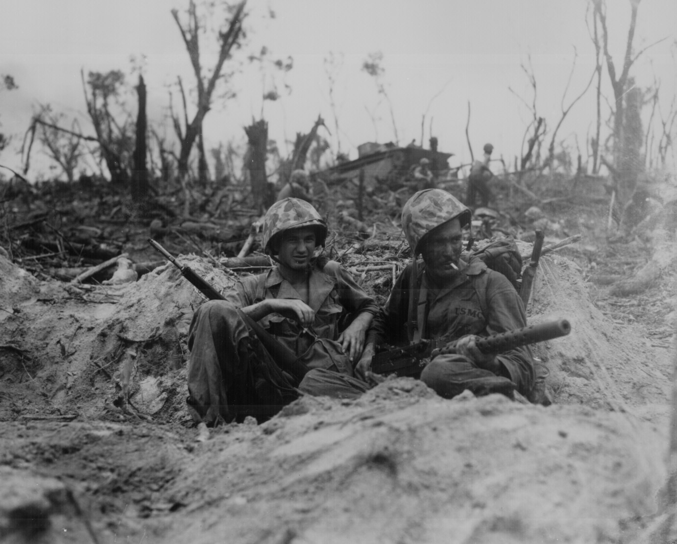 Weary Marines take a brief cigarette break 